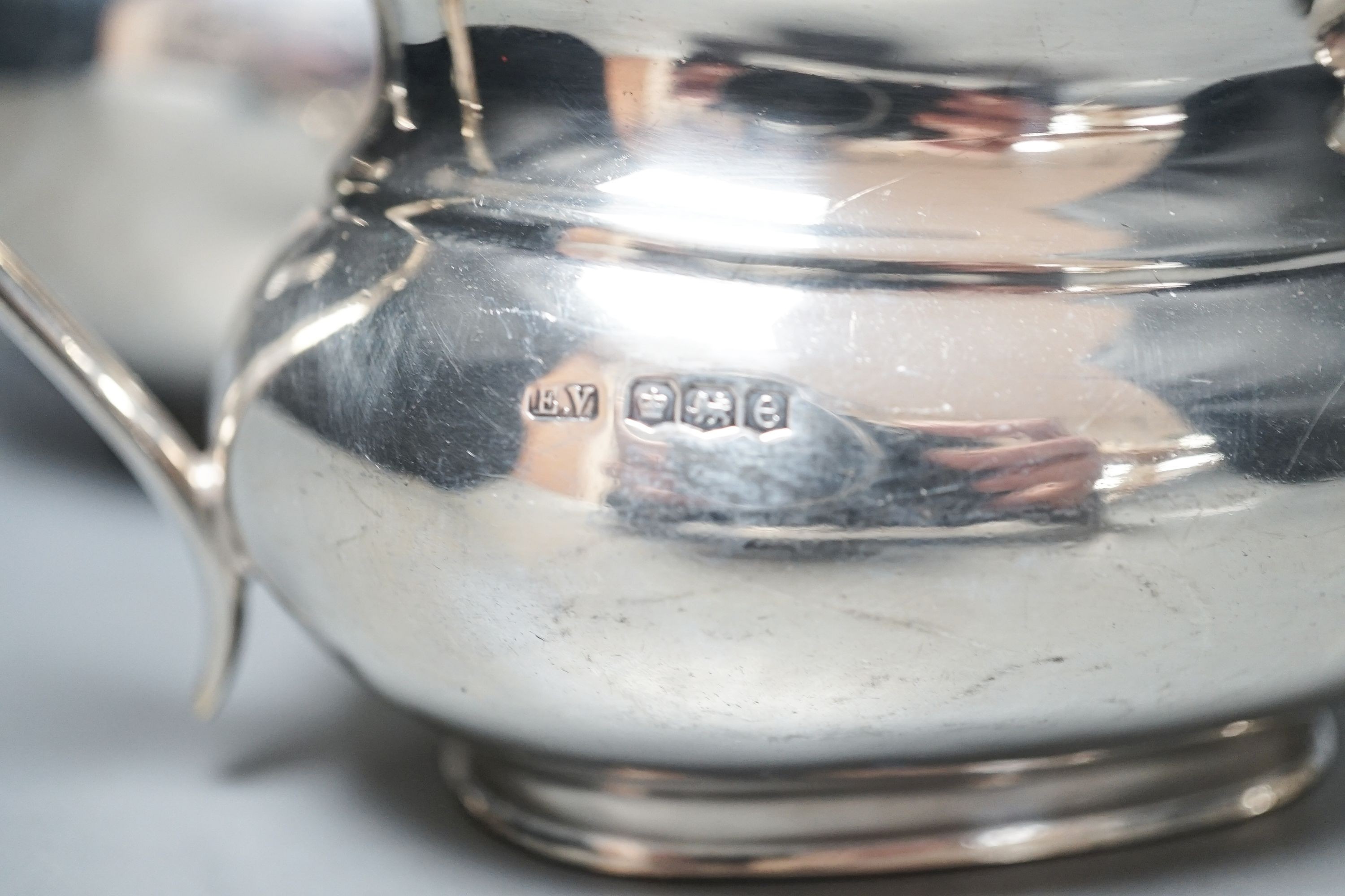 A George V silver three piece tea set, by Viner's Ltd, Sheffield, 1922/26, gross 39oz.